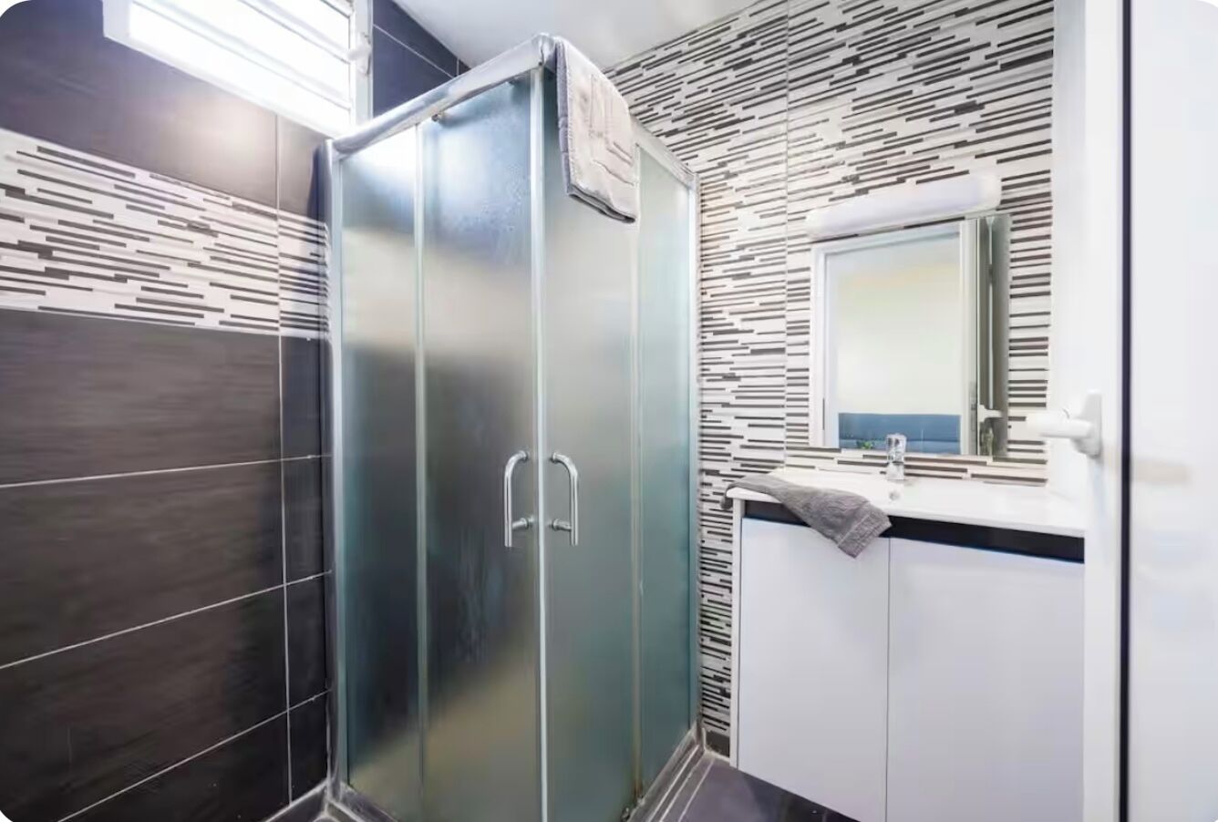Shower, towels, toilet paper