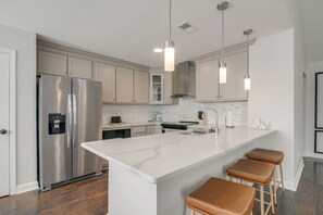 Fridge, microwave, stovetop, dishwasher - Walk to the Greenline: Sleek Cordova Home w/ Patio (Cordova)