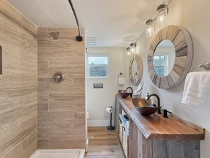 Shower, towels, soap, toilet paper