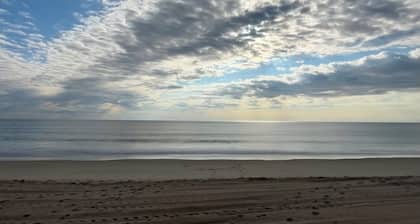 Comfy, family friendly beach house across the street from the beach!