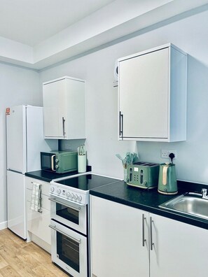 Fridge, microwave, oven, stovetop