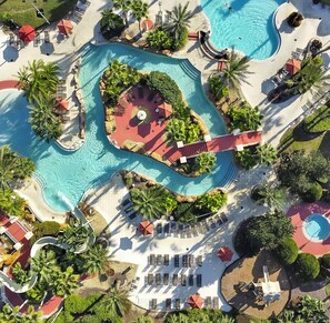 Outdoor pool, a heated pool - Ultimate Townhome-Pool/Lazy River-Waterslide-Hot Tub-Near Disney-No Resort Fees- (Davenport)
