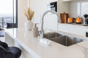 Fridge, microwave, oven, stovetop - Ruby 30F Sunset Penthouse | Ocean & City Views (Surfers Paradise)