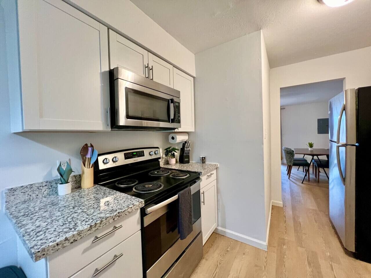 Dishwasher, coffee/tea maker, cookware/dishes/utensils