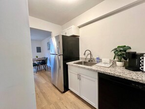 Dishwasher, coffee/tea maker, cookware/dishes/utensils