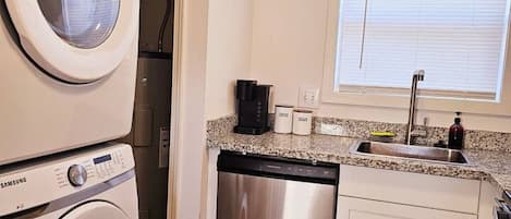 Dishwasher, coffee/tea maker, cookware/dishes/utensils