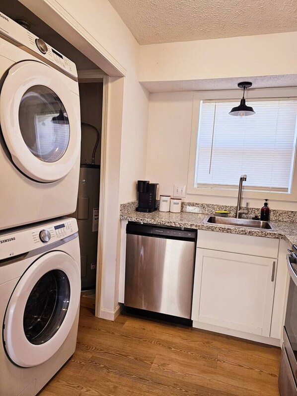 Dishwasher, coffee/tea maker, cookware/dishes/utensils