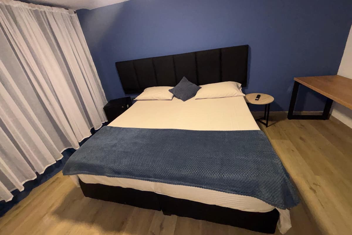 Classic Double Room | Down comforters, desk, free WiFi, bed sheets