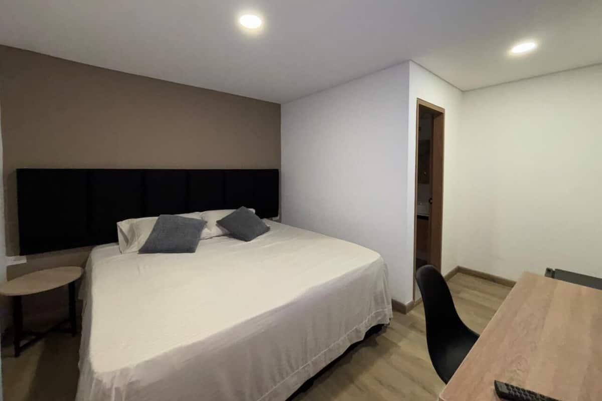 Classic Double Room | Down comforters, desk, free WiFi, bed sheets