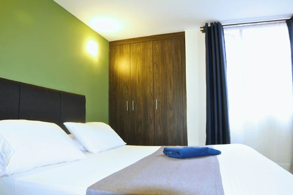 Down comforters, desk, free WiFi, bed sheets