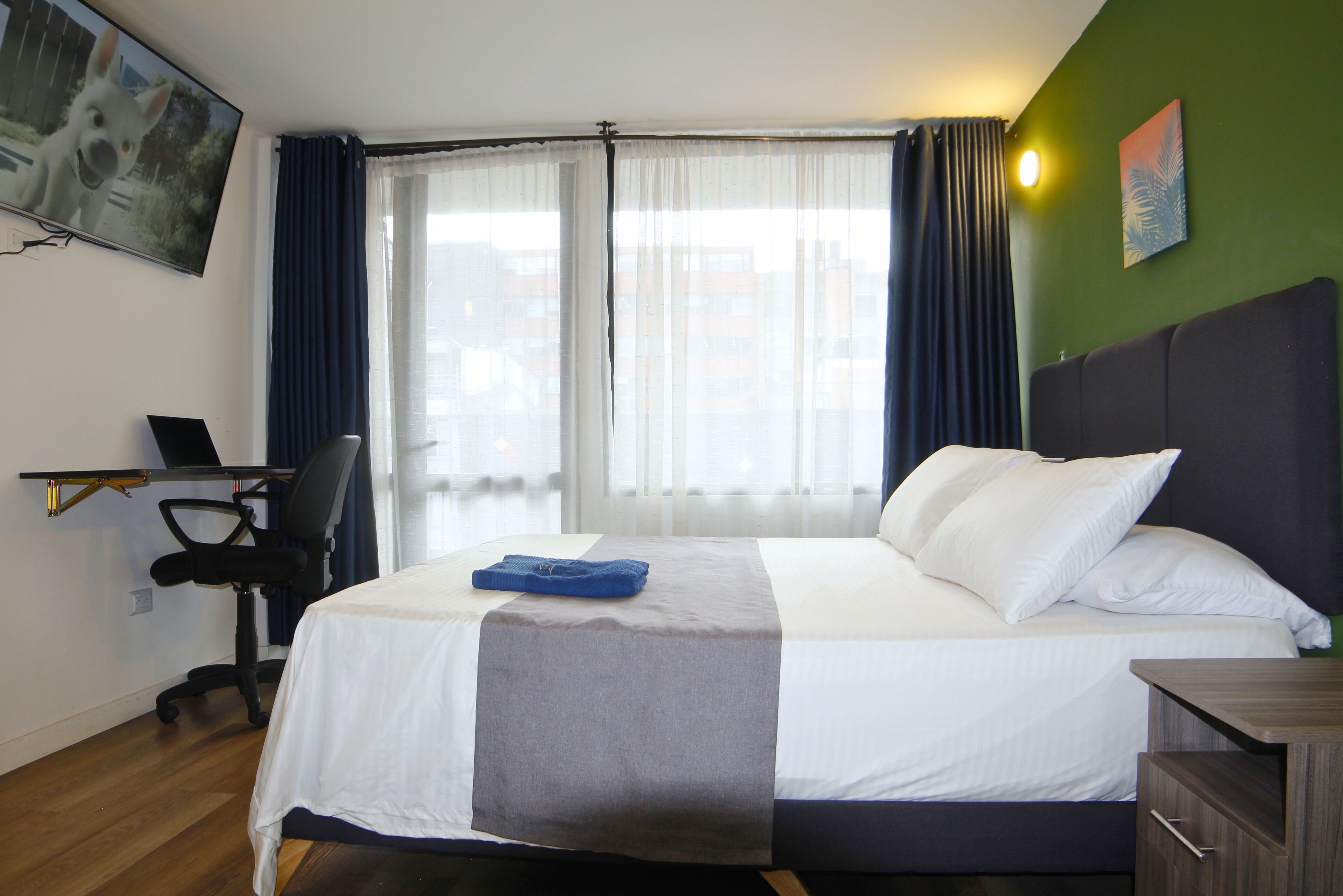 Down comforters, desk, free WiFi, bed sheets