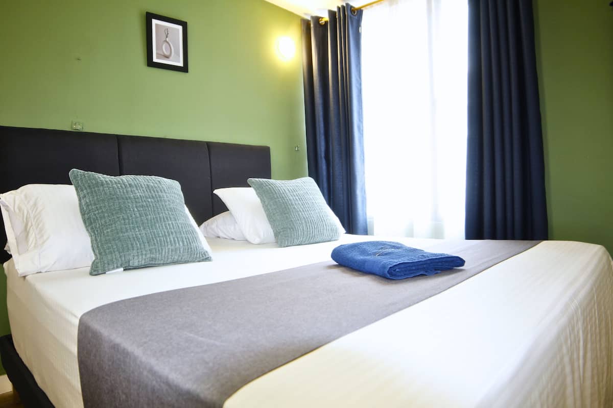 Standard Studio | Down comforters, desk, free WiFi, bed sheets