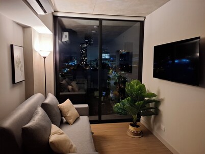 Modern 11th Floor Apartment Near La Sabana with Ultra Fast Wi-Fi and City Views.