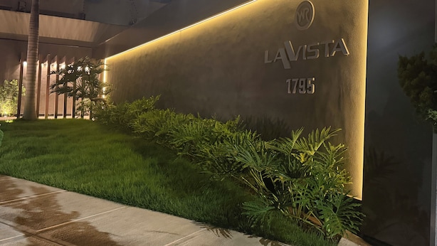 A modern building facade with a sign reading "LAVISTA 1795".