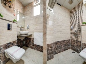 Shower, towels, soap, shampoo