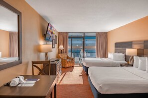 A hotel room with two beds, a desk, a chair, a window with curtains, and a view of the outside. - Landmark 1006 (Myrtle Beach)