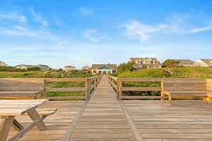 Terrace/patio - Just a Beach Cottage: Spacious 6BR, 5BA Oceanfront on Caswell Beach (Oak Island)