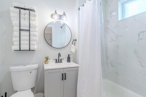 Hair dryer, towels, soap, toilet paper