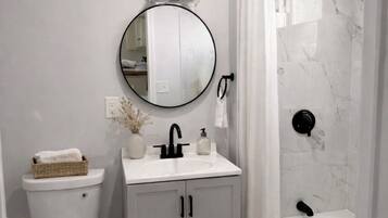 Hair dryer, towels, soap, toilet paper