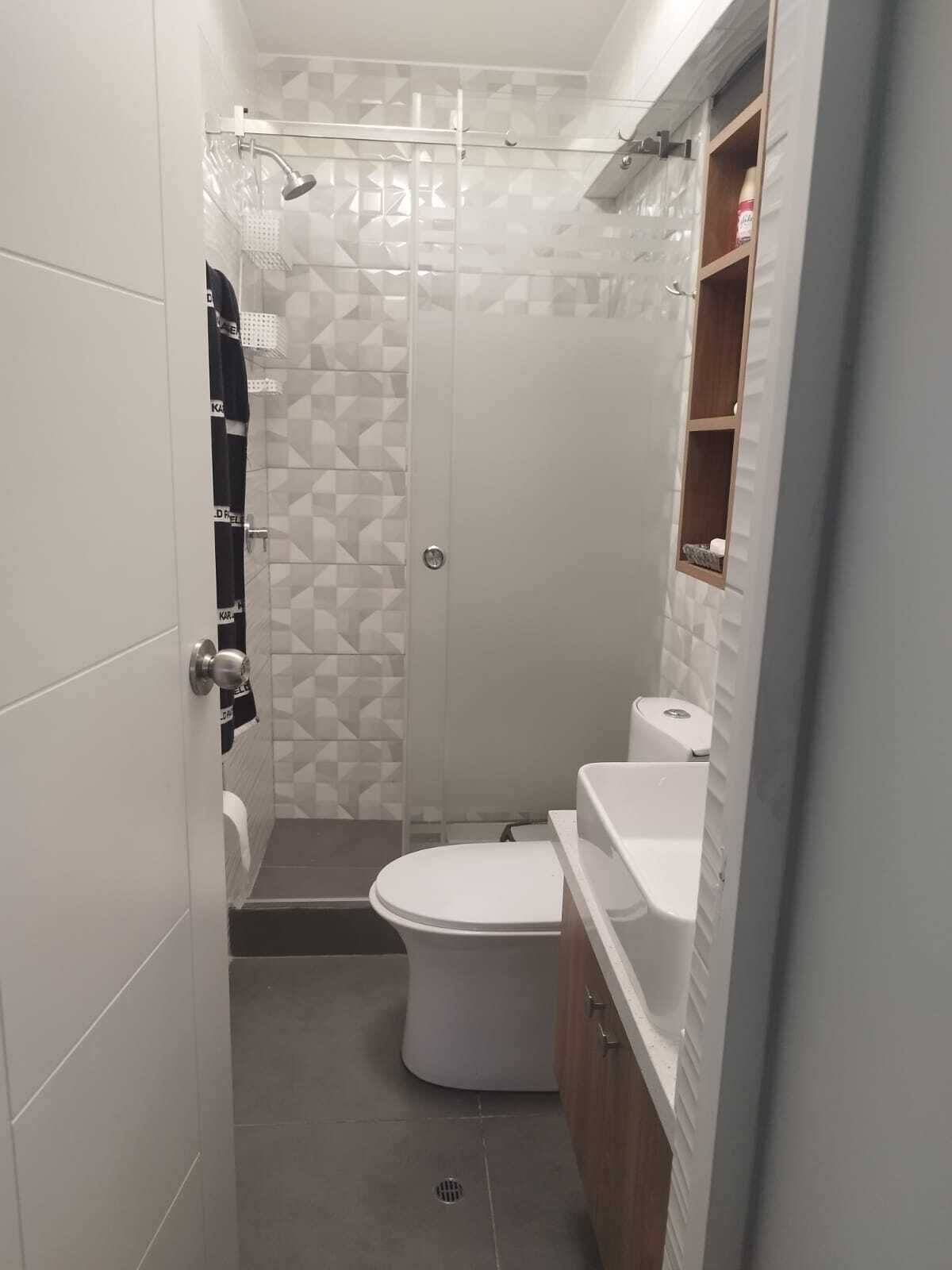 Hair dryer, towels, soap, shampoo