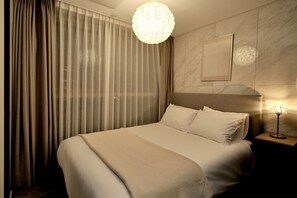 Individualmente mobiliados, Wi-Fi de cortesia, roupa de cama