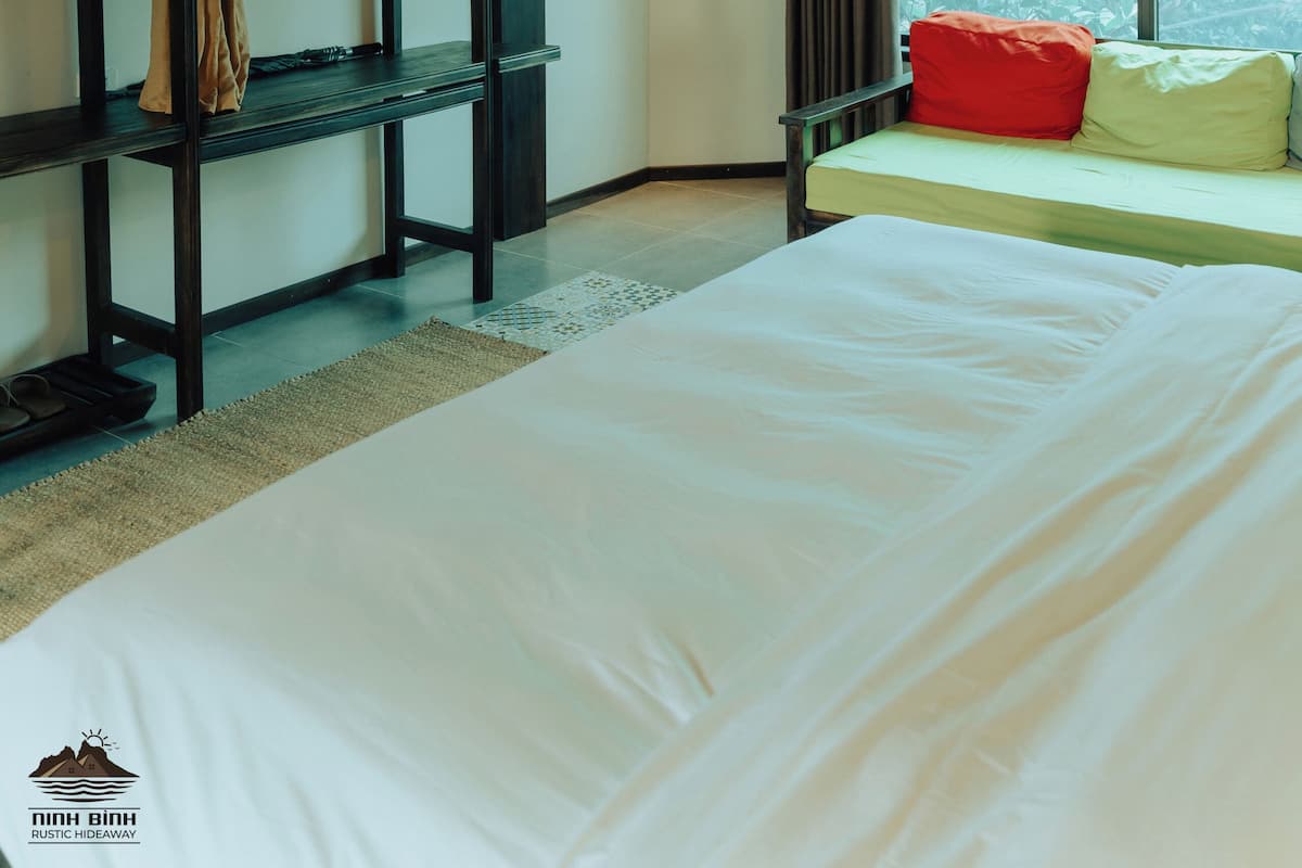 Deluxe Double Room with Sofa Bed and Bathtub