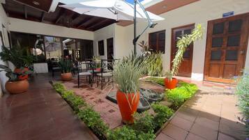 Classic Triple Room, Patio, Courtyard View | Terrace/patio