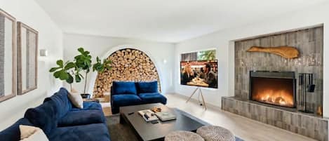 Smart TV, fireplace, music library, stereo