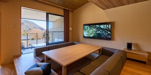 [A] 2 Double beds + 3 Futons / 111 sqm / Natural hot spring, Tatami-mat terrace (up to 7 guests) | Living area | Heated floors
