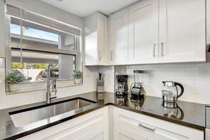 Fridge, microwave, oven, stovetop - Steps to Siesta Beach – Poolside 2BR Condo (Siesta Key)