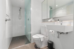 Hair dryer, towels, soap, shampoo - Open-Plan 2BR Unit w/ Parking in Prime Bondi Beach (Bondi Beach)