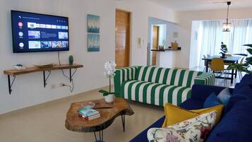 Apartment, 2 Bedrooms, Accessible, Balcony | Living room | Books