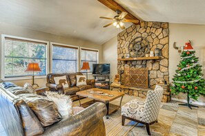 TV, fireplace, books - 2 Mi to Midtown: Ruidoso Retreat w/ Hot Tub! (Ruidoso)