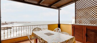 With beachfront terrace and air conditioning