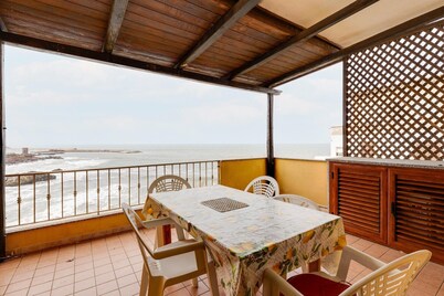 With beachfront terrace and air conditioning