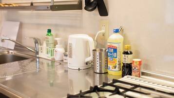 Fridge, microwave, stovetop, cookware/dishes/utensils