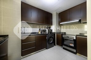 Apartment, Balcony, Sea View | Private kitchen - Bloomfields Iconic 1Br In Marina (Abu Dhabi)