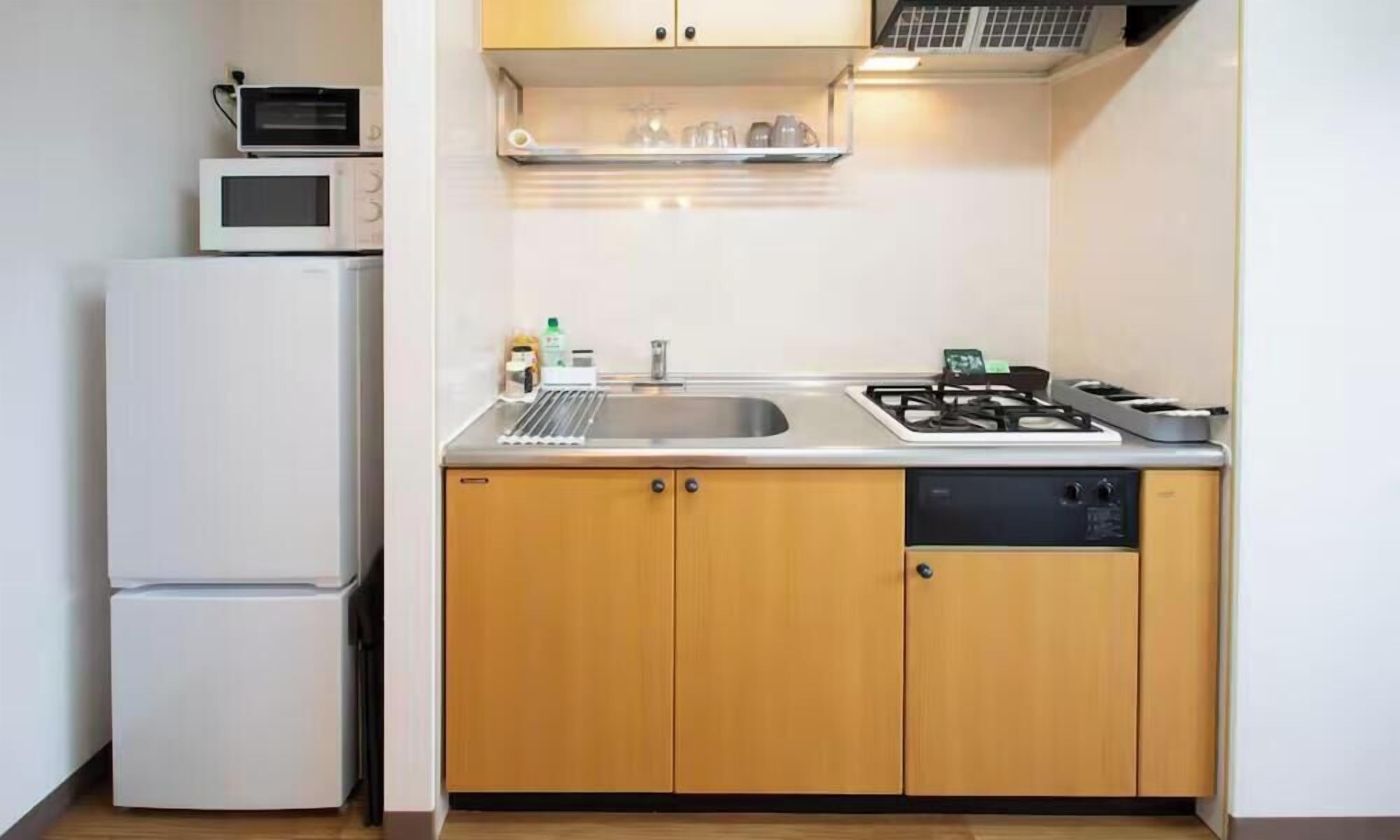 Fridge, microwave, stovetop, cookware/dishes/utensils