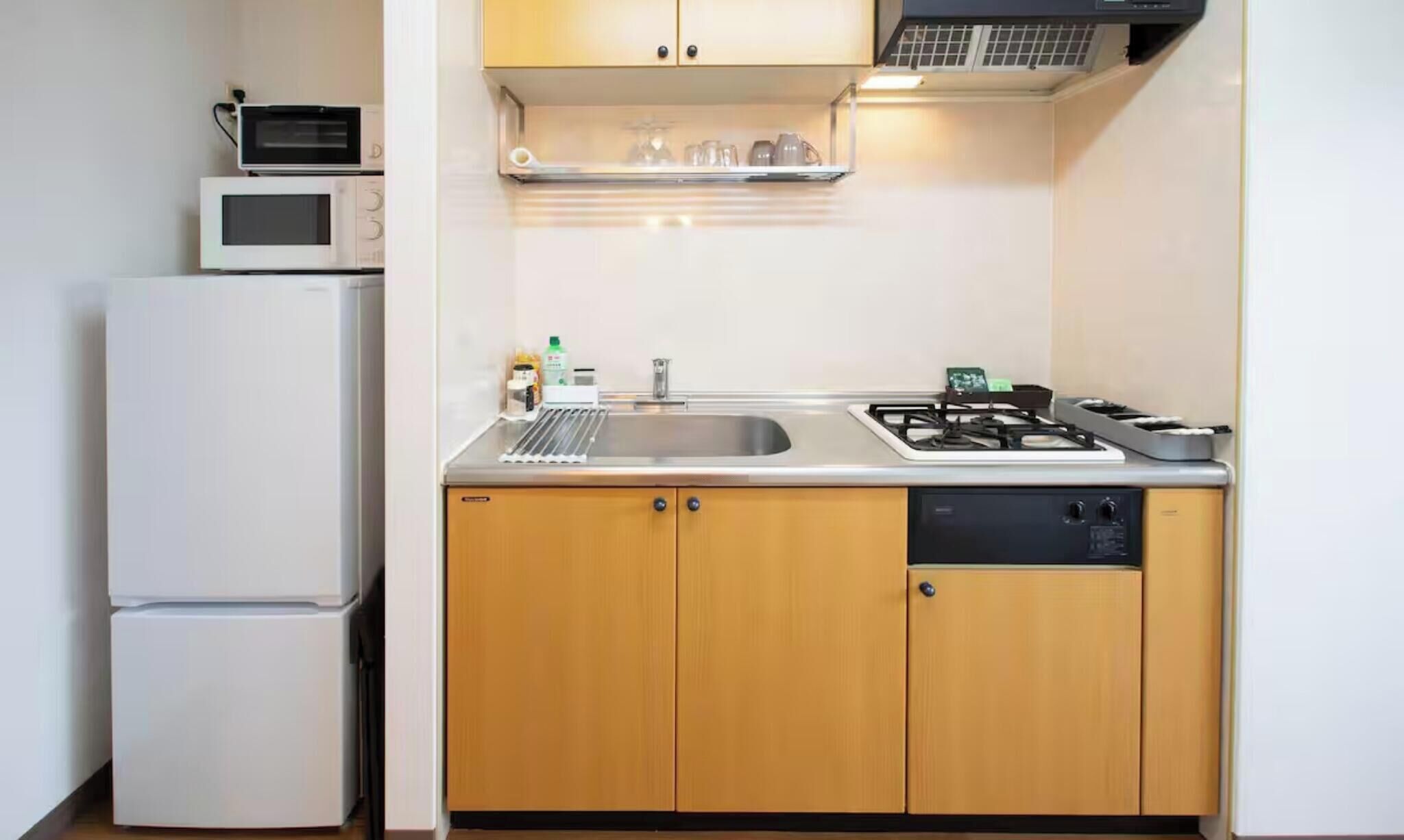 Fridge, microwave, stovetop, cookware/dishes/utensils