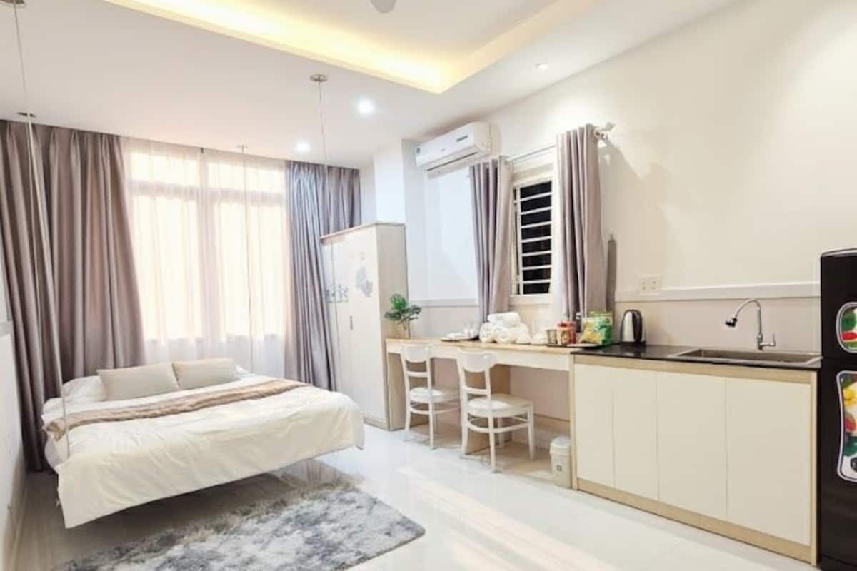 Deluxe Double Room, Kitchen, City View | Desk, laptop workspace, free WiFi