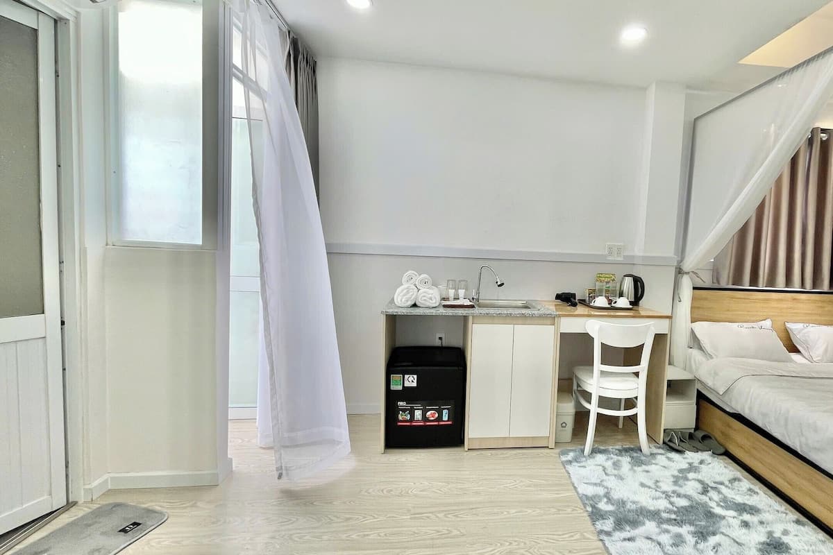 Deluxe Double Room, Balcony, City View | Desk, laptop workspace, free WiFi