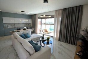 Living area - Villa 101 X Rhodes – Luxury Stone-Built Retreat with  Pools & Panoramic Views (Ixia)