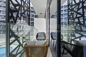 Apartment, Balcony, Pool View | Property grounds - Bloomfields Stunning STU The Gate Masdar (Abu Dhabi)