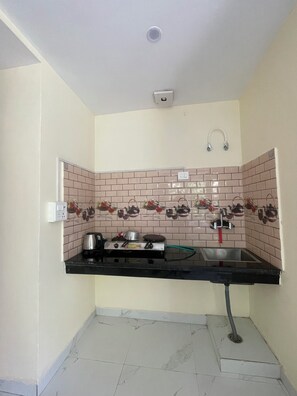 Estudio Deluxe, vista a la montaña | Cocina privada