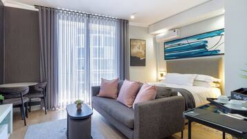 Deluxe Studio Suite, Balcony, Mountain View | Laptop workspace, blackout drapes, free WiFi