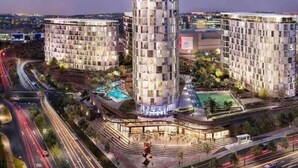 A modern hotel complex with multiple high-rise buildings, a central courtyard, and a swimming pool. - Lux Ellipse Galelileo (Midrand)