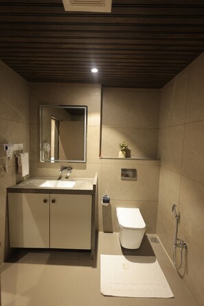 Superior Studio Suite | Bathroom | Shower, free toiletries, hair dryer, towels - Vrindavan Residency (Chakur)