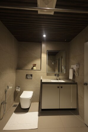 Superior Studio Suite | Bathroom | Shower, free toiletries, hair dryer, towels - Vrindavan Residency (Chakur)