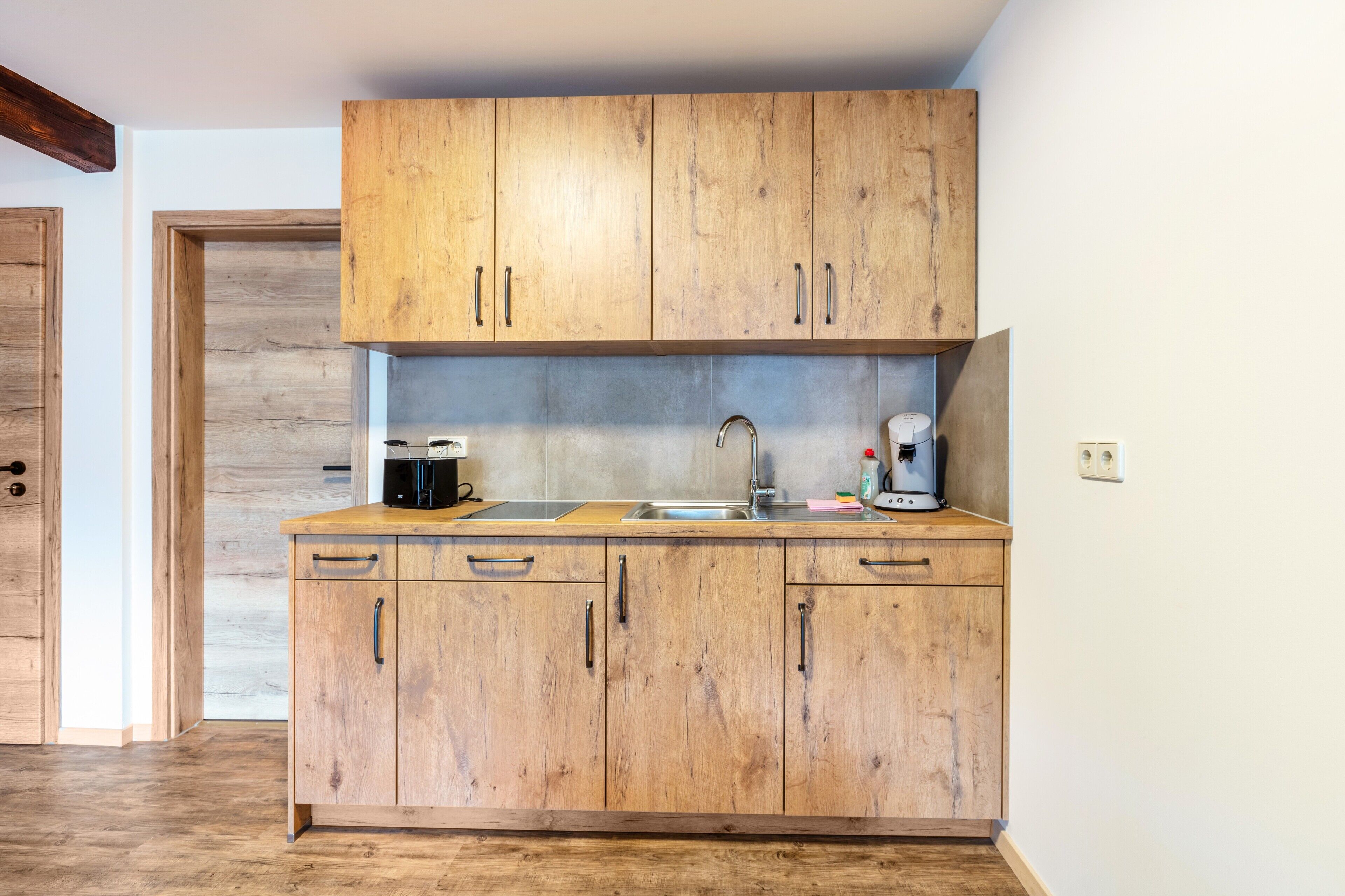 Fridge, stovetop, coffee/tea maker, electric kettle