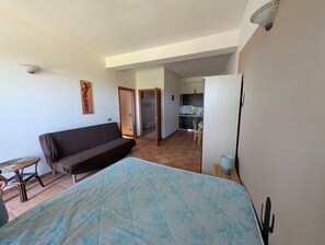 Living area - Apartment 'Pathos Retreat Quadrupla' with Shared Pool, Wi-Fi and Air Conditioning (Arenella)